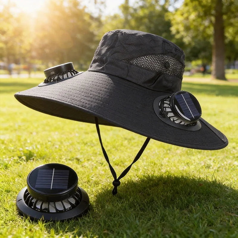 Black sun hat with solar-powered fans on a grassy background
